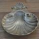 Empty-pocket scallop shell