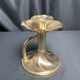 Brass candlestick in a fluted shape from the early 20th century.