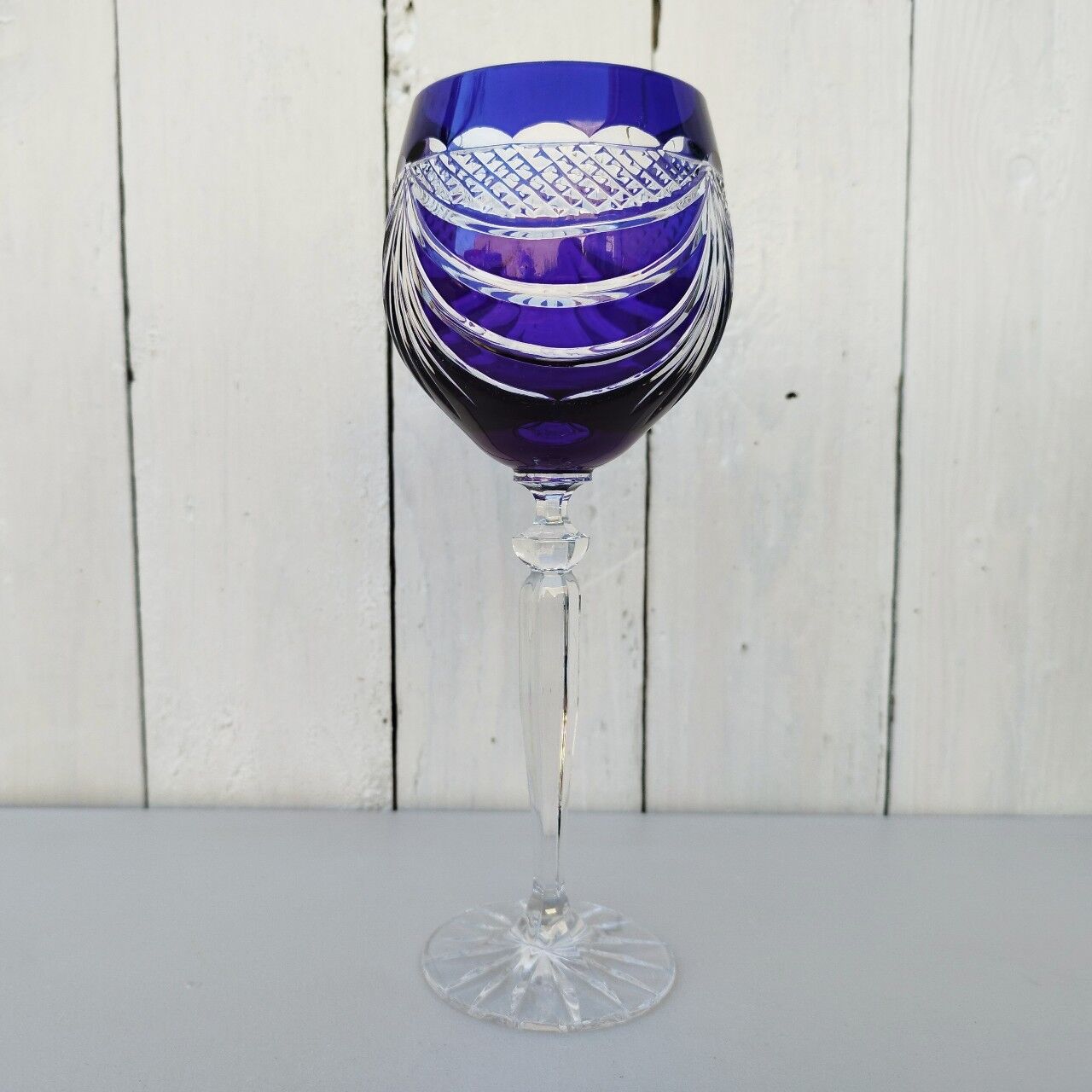 Six vintage coloured cut crystal wine glasses