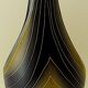 Earthenware vase decorated with yellow lines on a black and yellow background