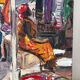 Market in Dakar, oil on panel signed G Vignesoult.