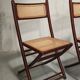 Chaises pliantes en bois et cannage, 80's
