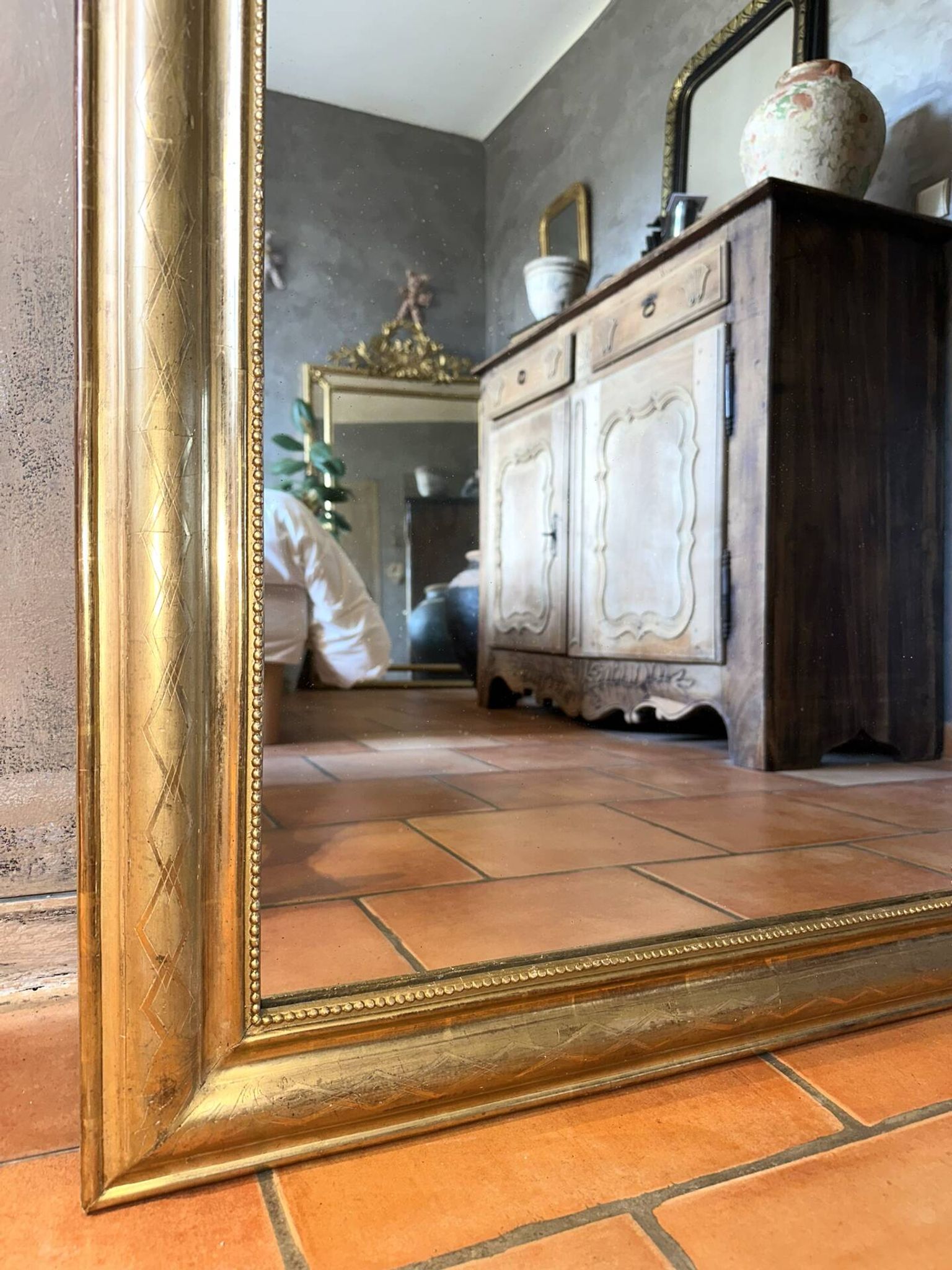 Antique Louis-Philippe gilded mirror from the late 19th century.