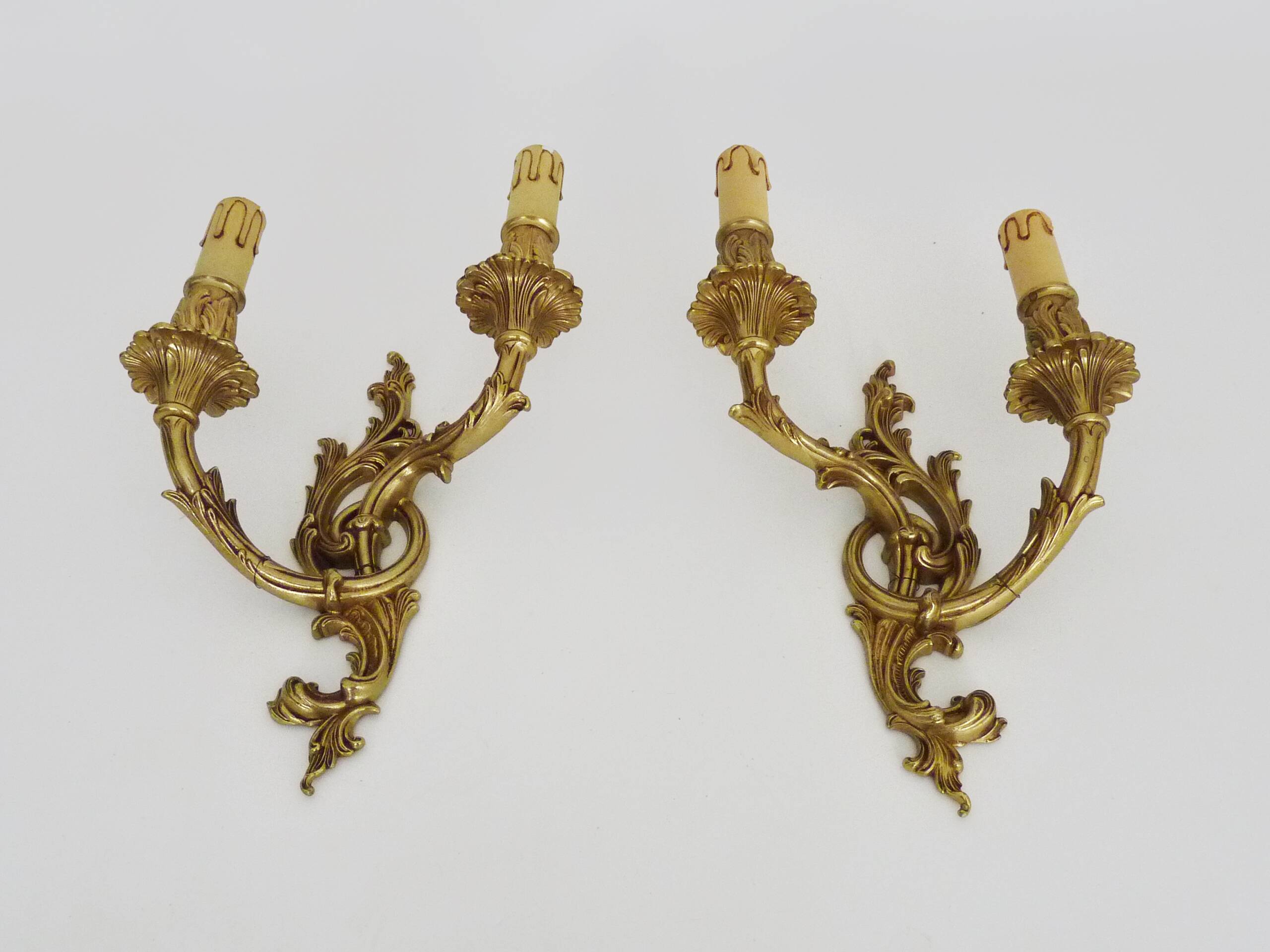 Vintage pair of double wall sconces in bronze from the 1960s.