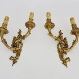 Vintage pair of double wall sconces in bronze from the 1960s.