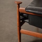 Finished Juhl armchair and its ottoman.