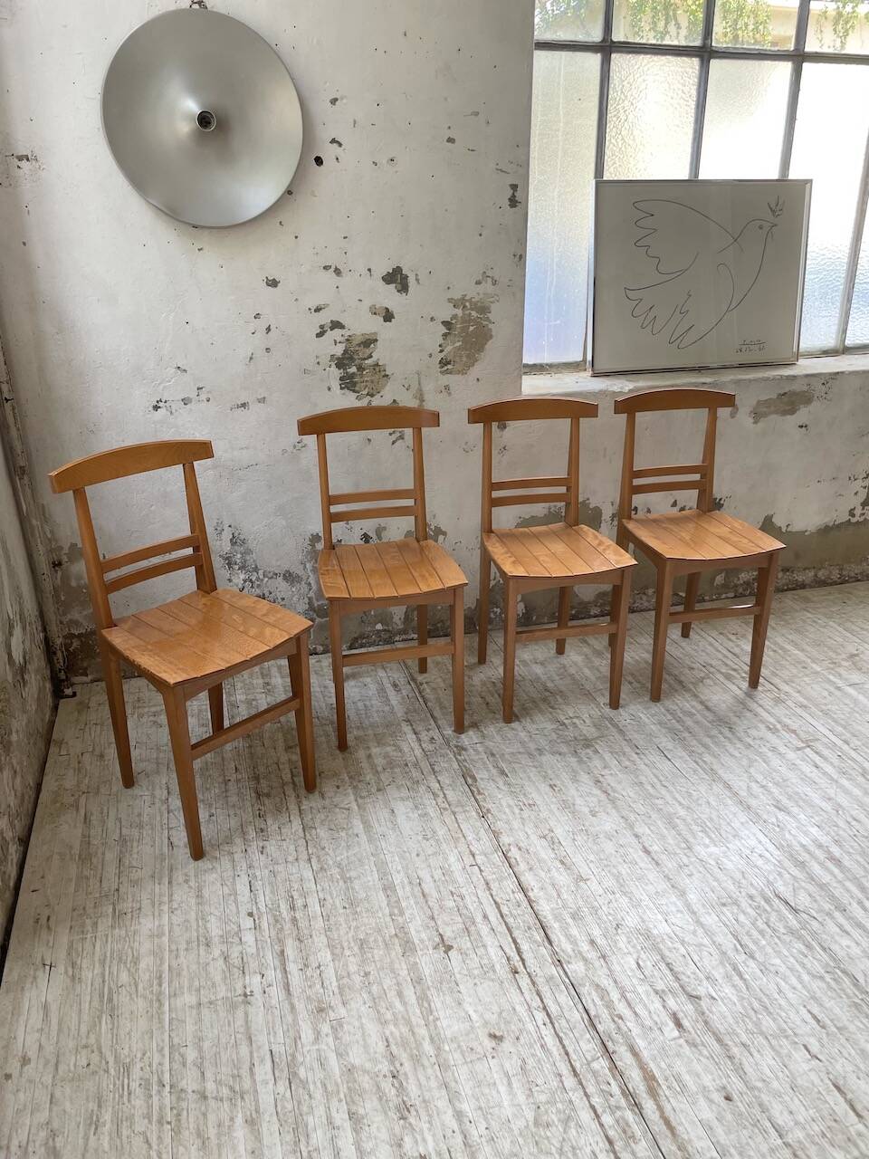 4 golden oak chairs