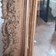 Antique Louis Philippe mirror with a pediment.