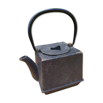 small cast iron teapot