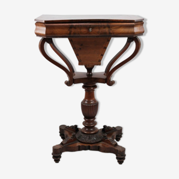 Antique mahogany sewing table on a pillar from around the year 1840s