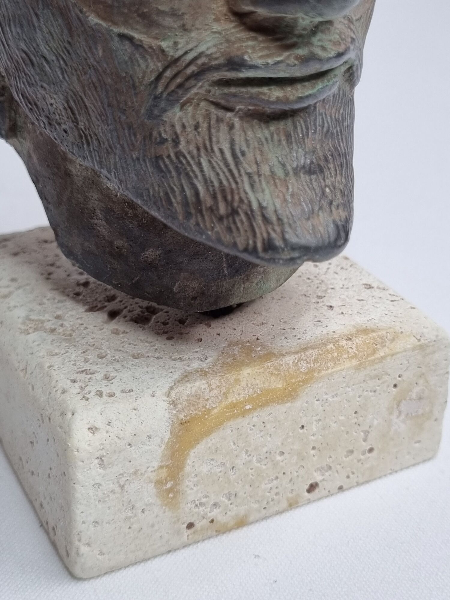 Head of Zeus in patinated plaster in imitation of bronze, 15 cm