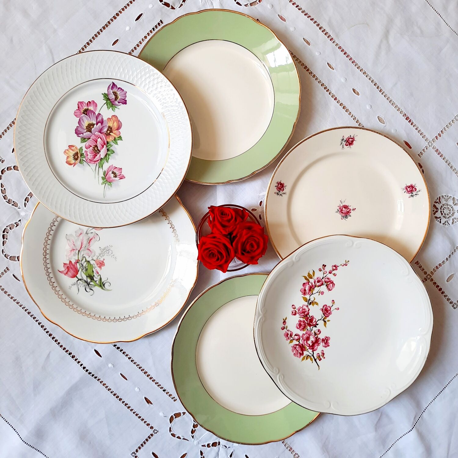 Flat antique earthenware plates with gilded edges