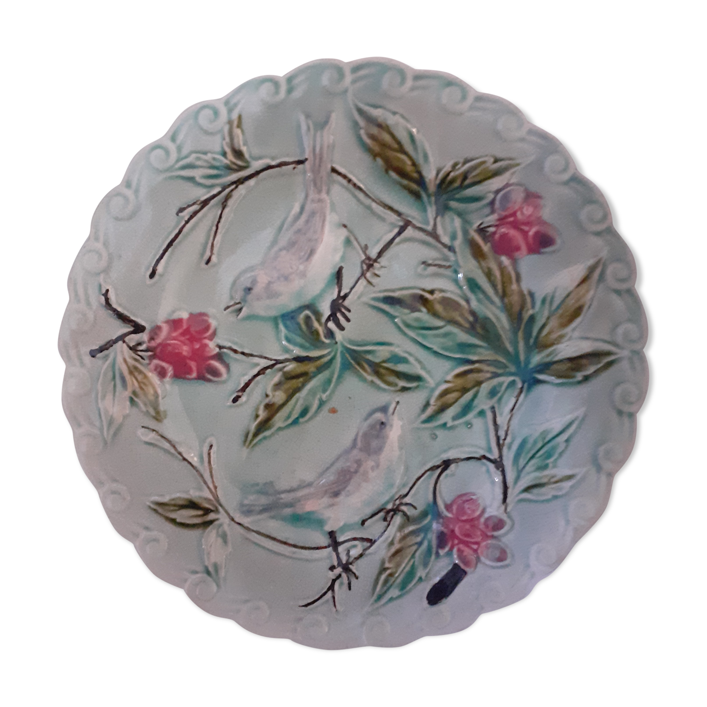 Light turquoise slip plate. Birds.