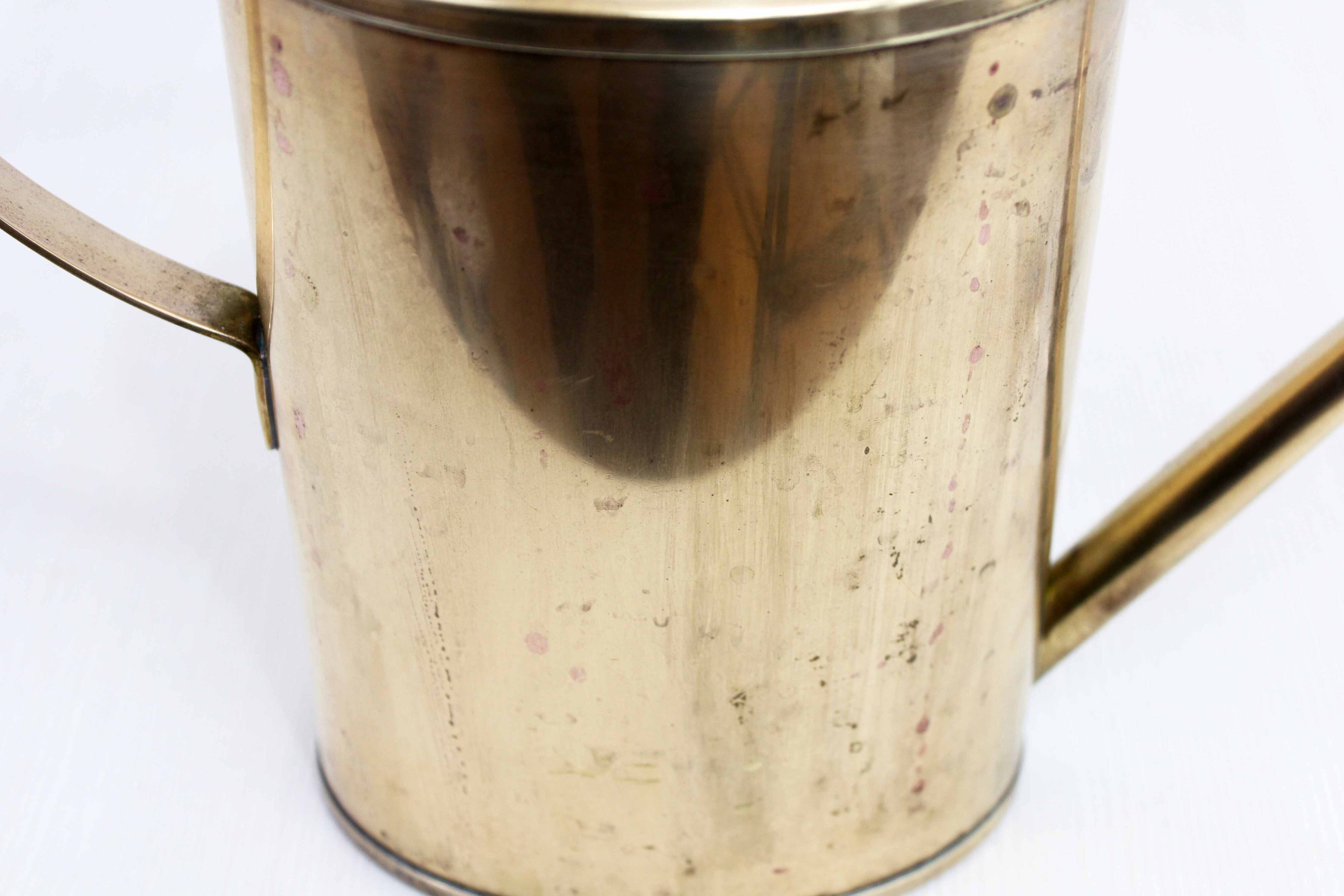 Vintage brass watering can