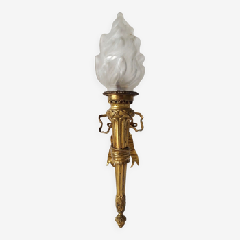 Torch wall lamp in gilded bronze Louis XVI Circa Napoleon III style.