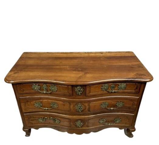 Curved Louis XV period chest of drawers in walnut and gilded bronze from the 18th century