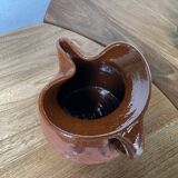 Glazed earthenware jug