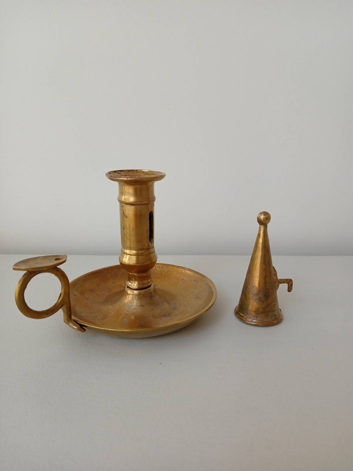 Set of 2 brass cellar rat candlesticks