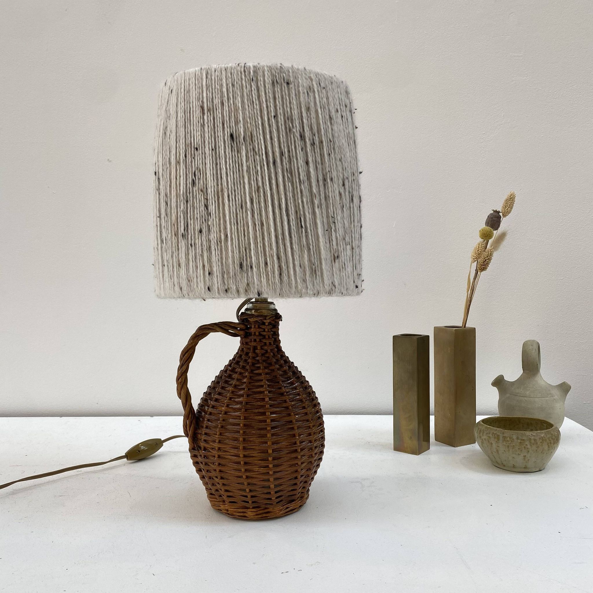 Rattan lamp and its mottled white wool lampshade