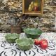Large earthenware salad bowl in the shape of a cabbage leaf.