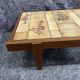 Table basse en bois et céramique herbier