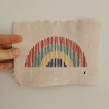 Rainbow embroidery on recycled paper