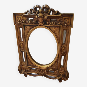 Old small golden mirror