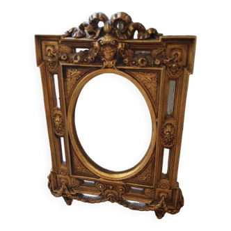 Old small golden mirror