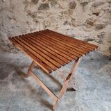 Vintage folding garden table in pine, mid-20th century.