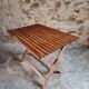 Vintage folding garden table in pine, mid-20th century.