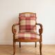Classic armchair in wood and burgundy fabric