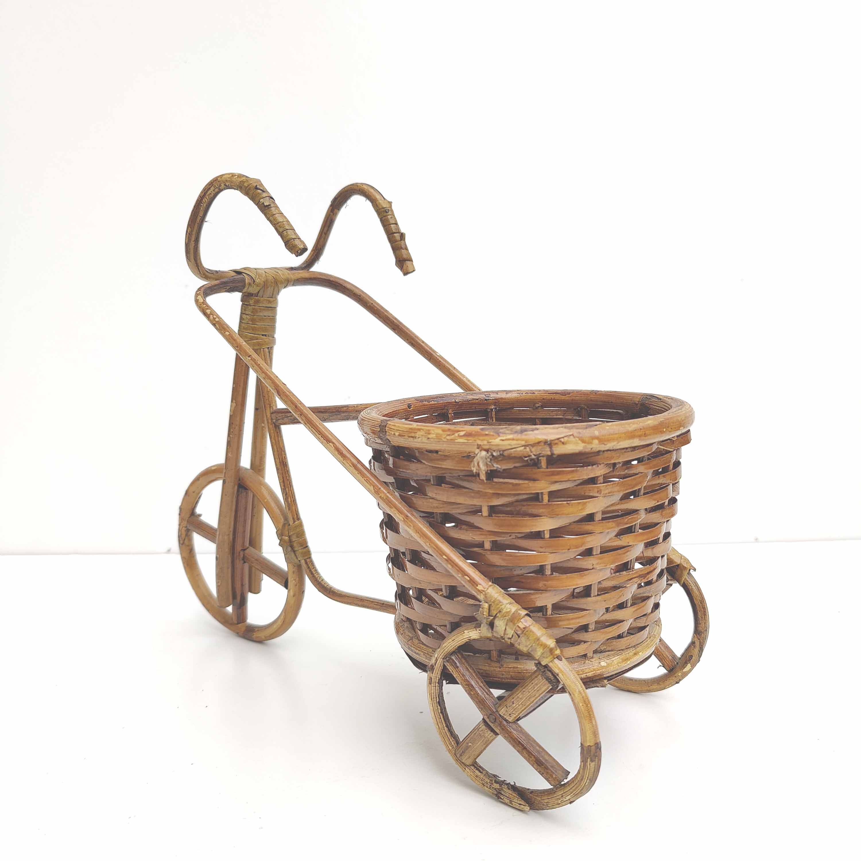 Vintage rattan bicycle plant holder