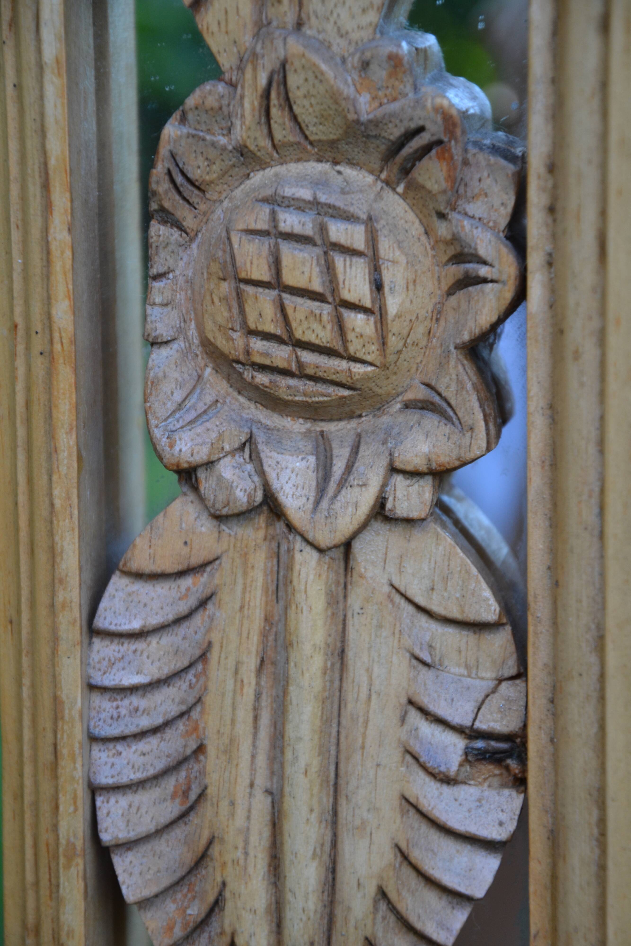 Large carved wooden mirror