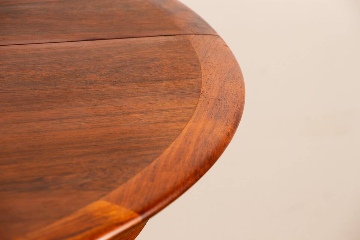 Danish extendable dining table in rosewood by Kai Lyngfeldt Larsen.