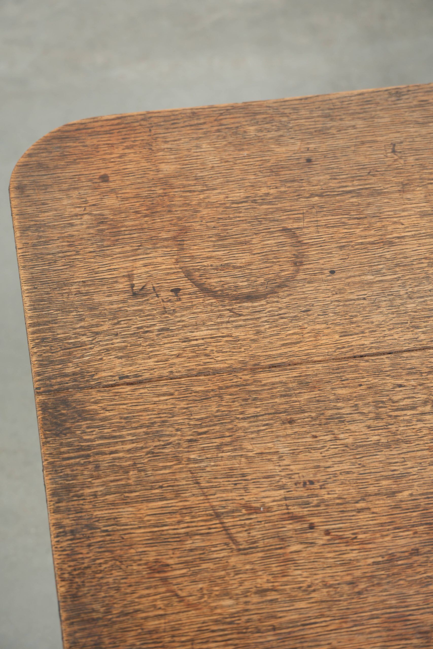 Antique English oak tilt top table from the 19th century in a unique shape