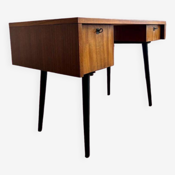 Vintage wooden desk with black conical legs