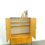 Armoire en placage Hellerau avec pieds et tiroirs en acier