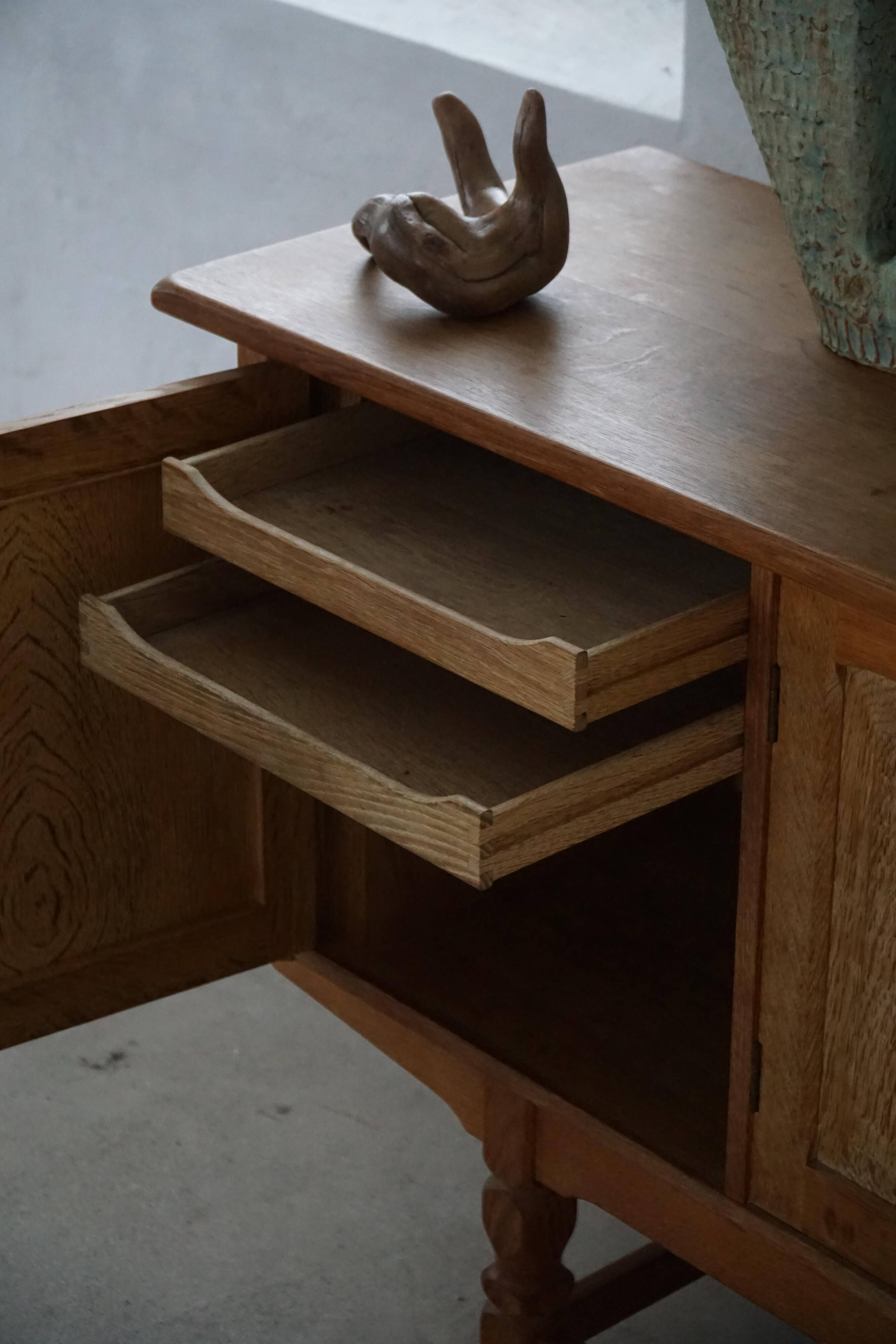 Low oak sideboard, mid-century modern, made by a Danish cabinetmaker, 1960s.
