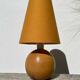 Lampe boule en bois tourné jaune 1980