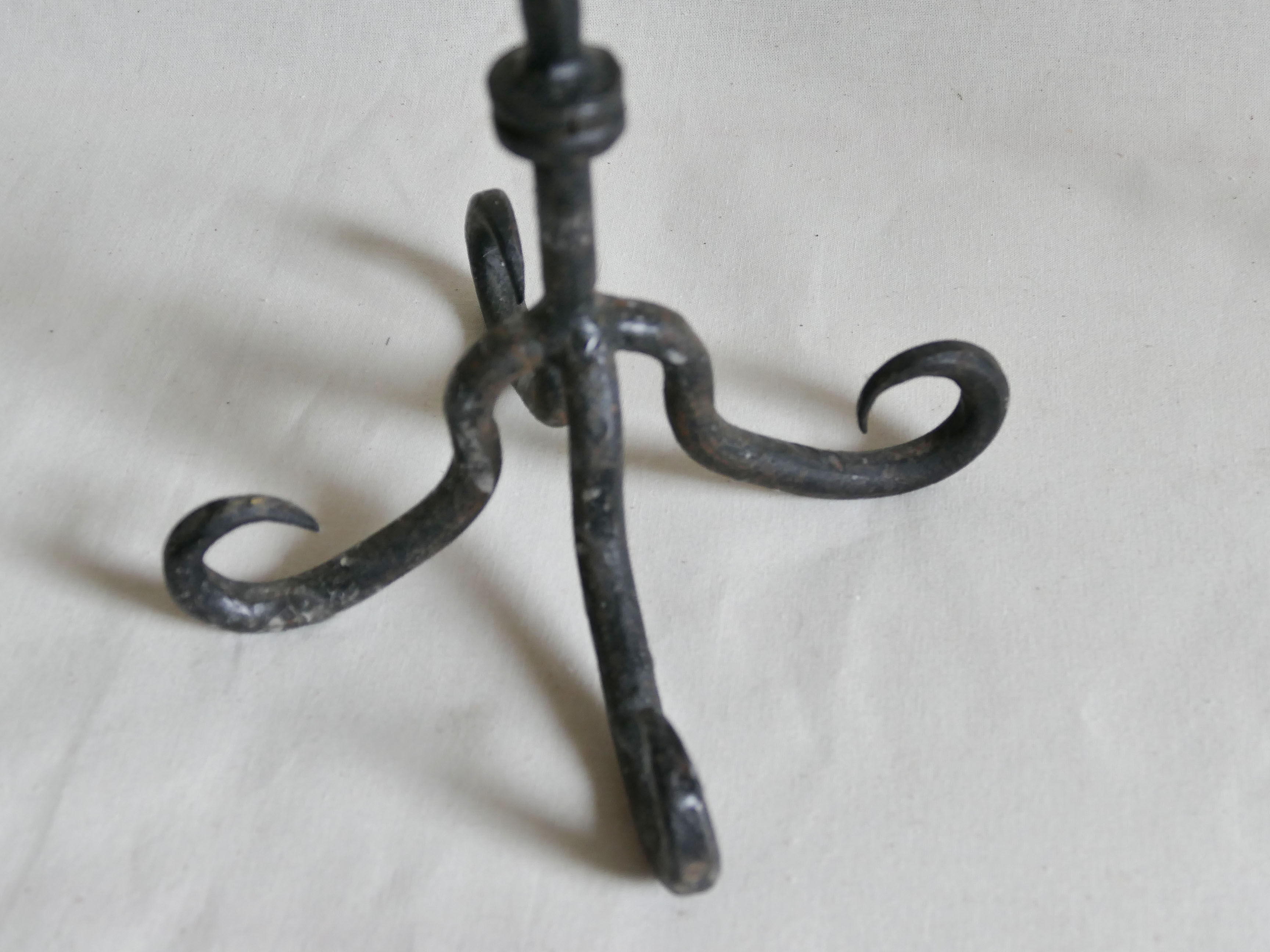Pair of antique wrought iron chandeliers