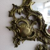 Louis XV style mirror, with bronze frame.