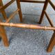2 wooden dining chairs with rush seats from the 1970s.
