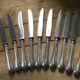 Set of 10 antique silver metal knives