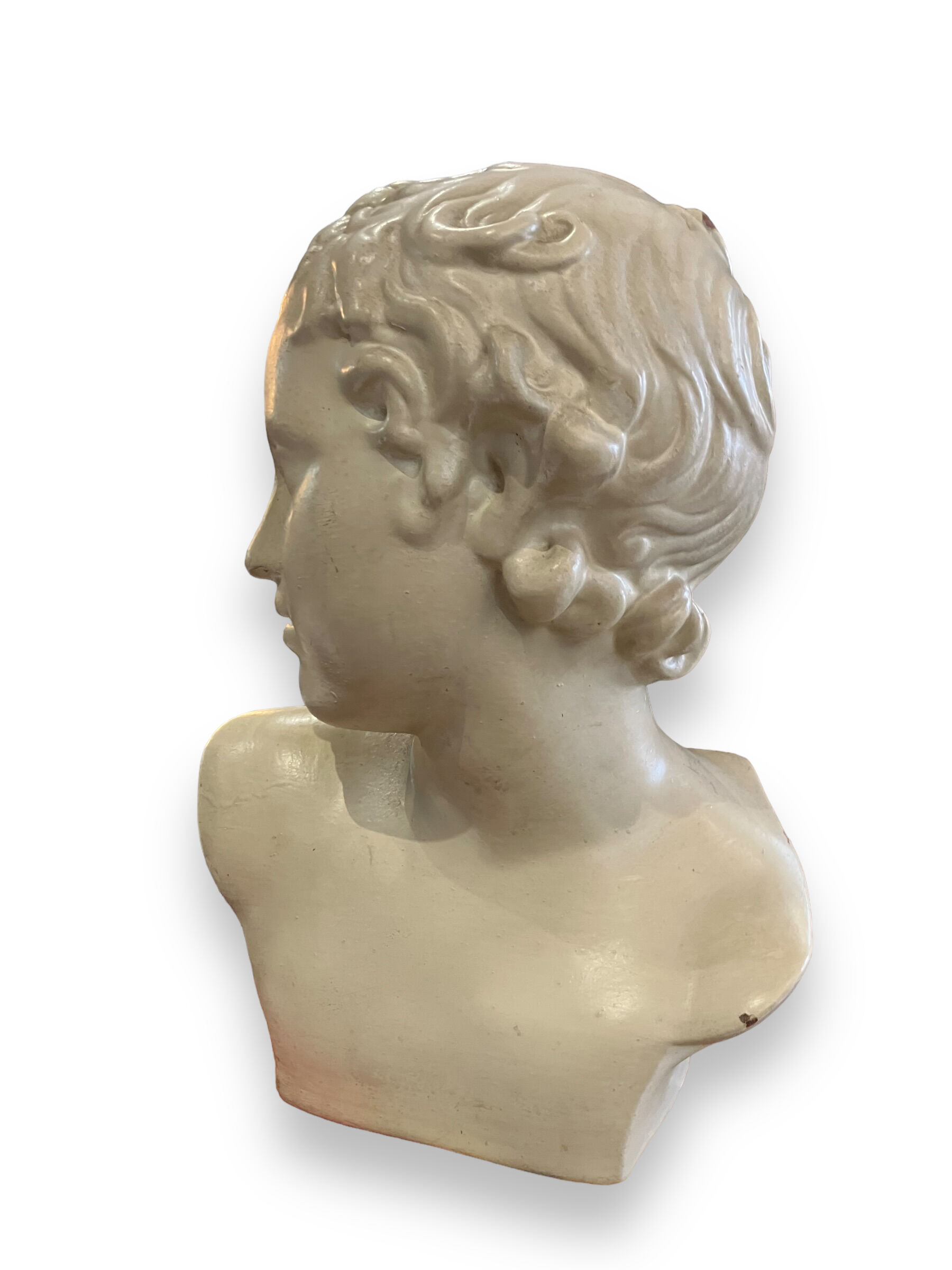 Bust of eros in glazed terracotta