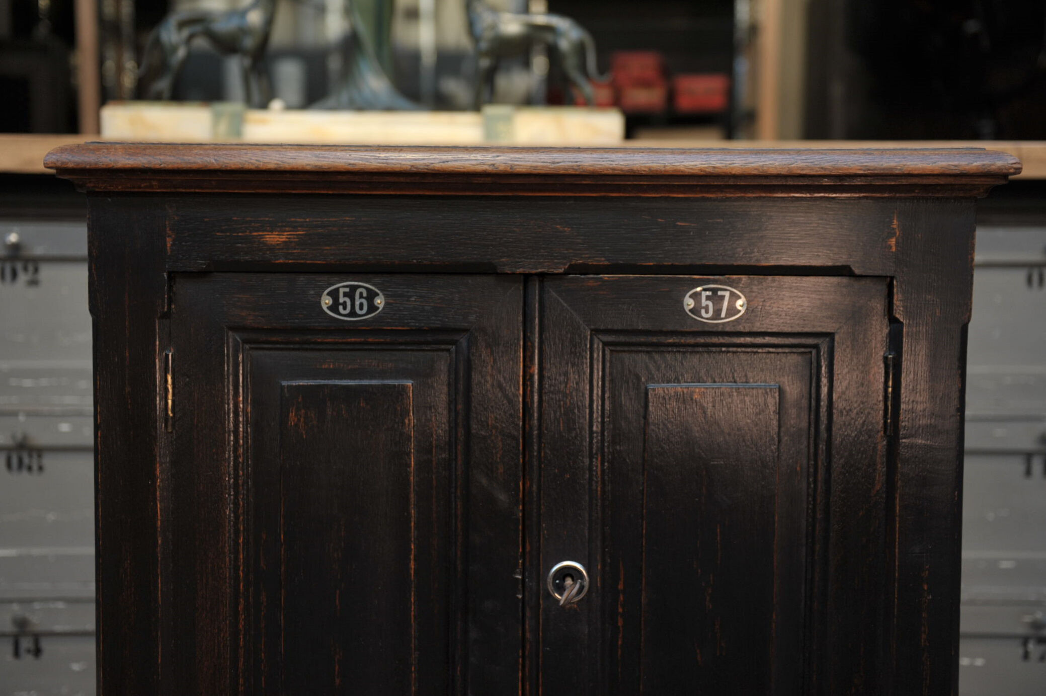 1930s Oak furniture with 2 black patinated doors.