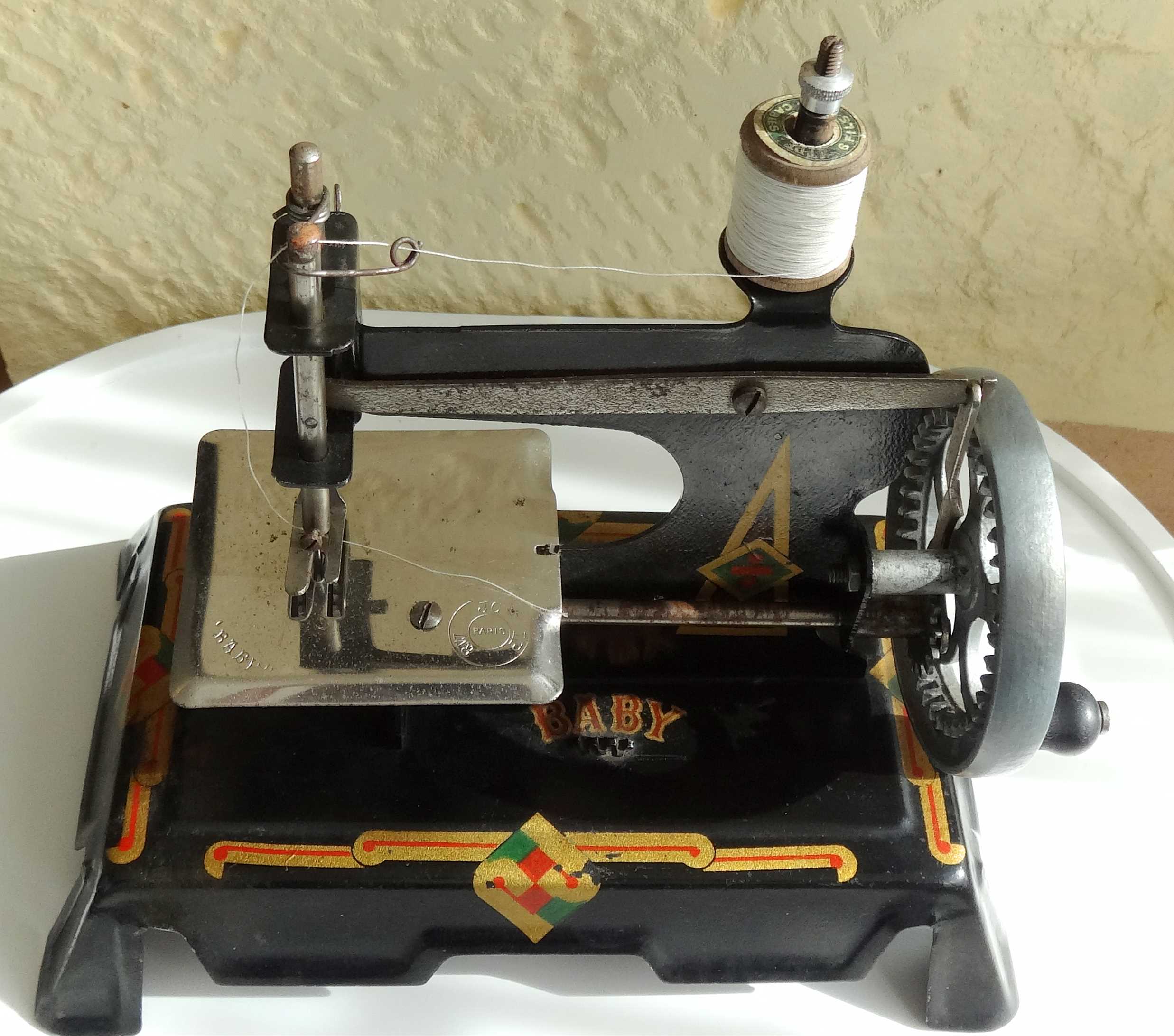 Baby sewing machine years 20-30