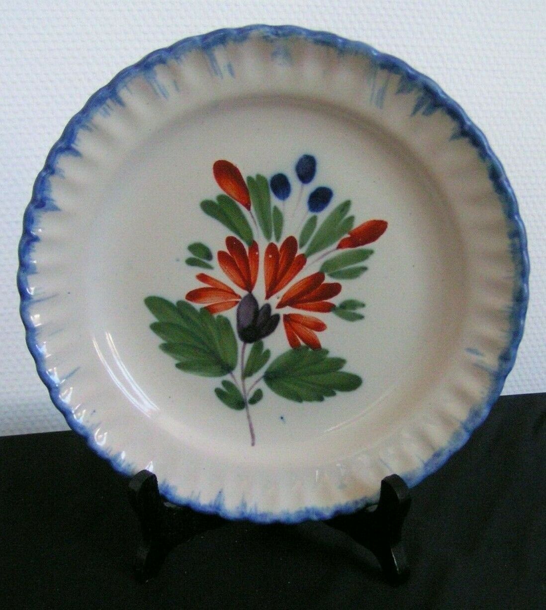 Earthenware plate with polychrome floral decoration XIXth