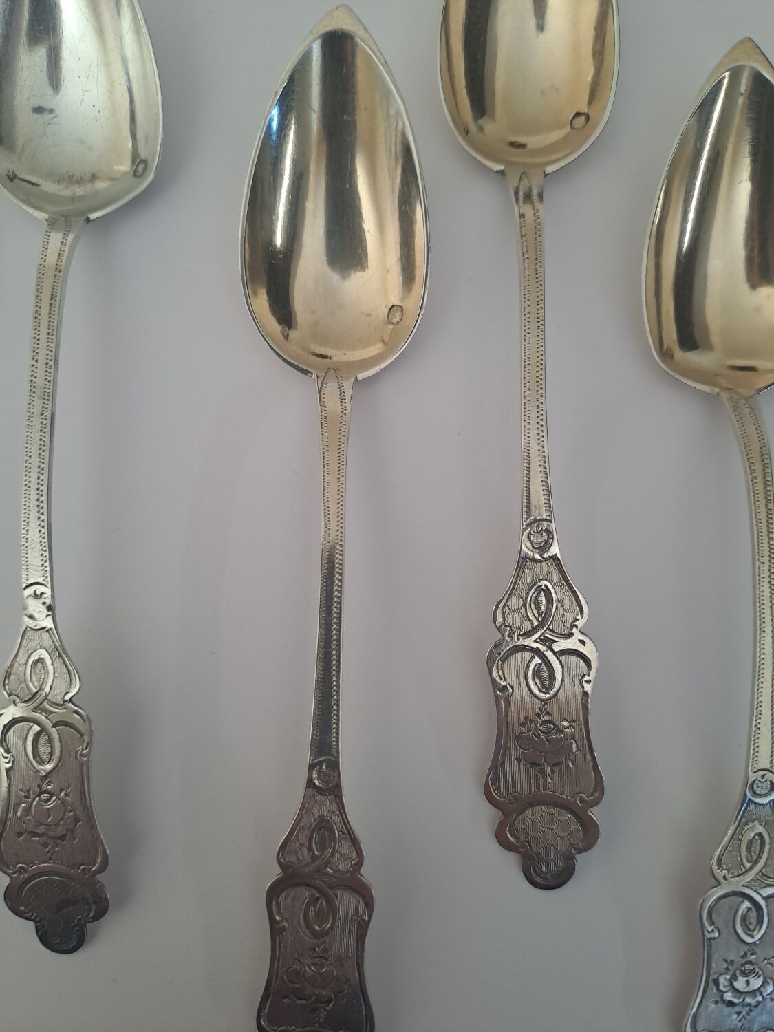 6 small numbered silver teaspoons, Minerva hallmark.
