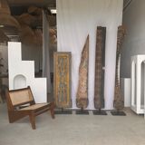 Rectangular Indonesian construction element with blue and yellow plant in carved wood