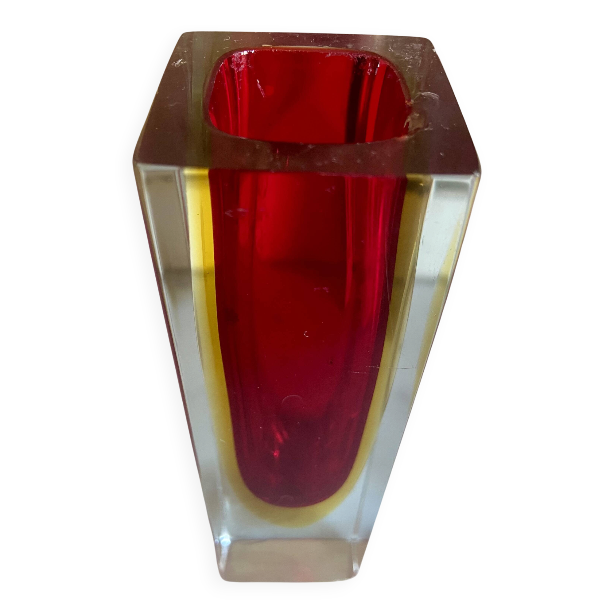 Small red vase made of Murano glass.